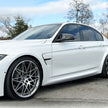 BMW M4 F82 Carbon Fibre Side Skirt Extensions — front three-quarter view