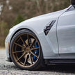 BMW M3 G80 Carbon Fibre Air Vent Trims — front three-quarter view