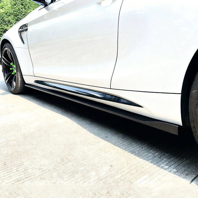 BMW M2 F87 OEM Style Carbon Fibre Side Skirt Extensions — front three-quarter view
